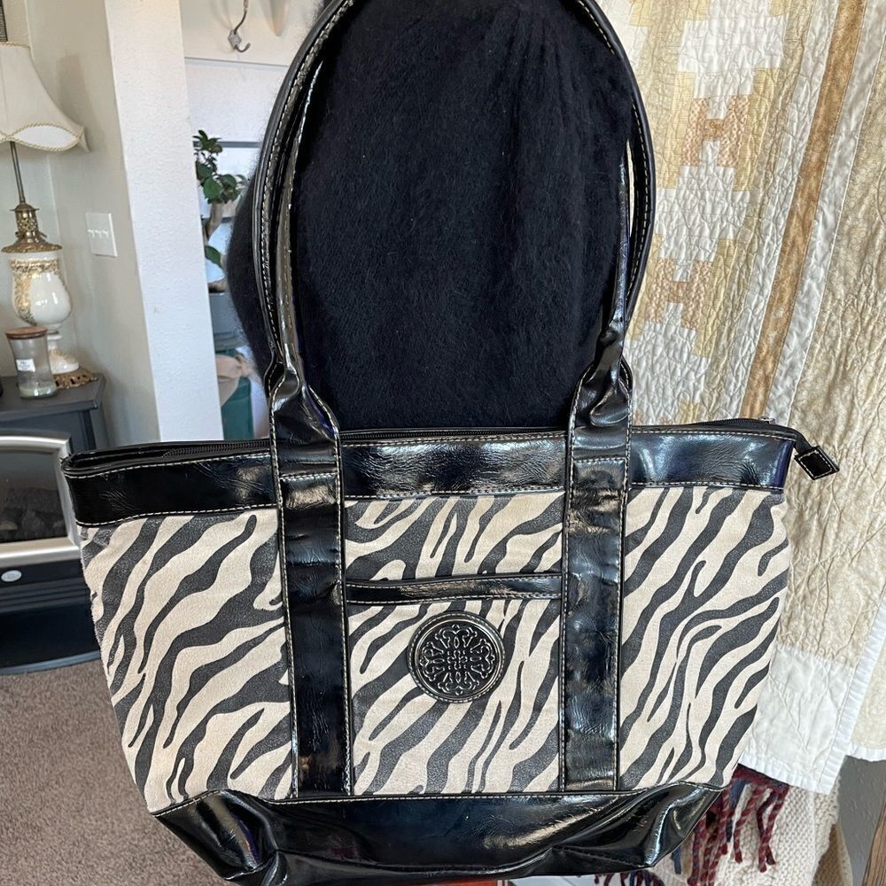 Pre-Owed Treviso Animal Print Tote with White Gold Accents